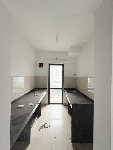 Kitchen in 1 BHK Apartment at Lodha Palava City Lakeshore Greens, Dombivli East – for Rent