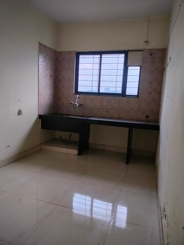 Kitchen in 1 BHK Apartment at Vishal Srushti Residency, Wadgaon Sheri – for Rent