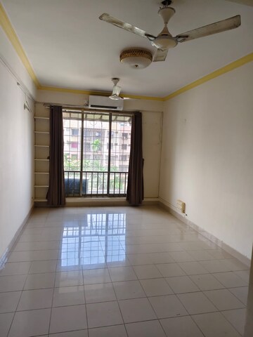 Room in 2 BHK Apartment at Panchsheel Gardens, Kandivali West – for Rent