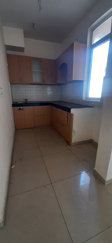 Kitchen in 2 BHK Apartment at Land Craft Golf Links Villa, Pandav Nagar – for Rent