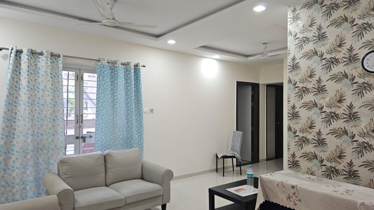 Living Room, uttam-townscapes 2 Bedroom 770 Sq.Ft. Apartment In Yerawada Pune 9131349