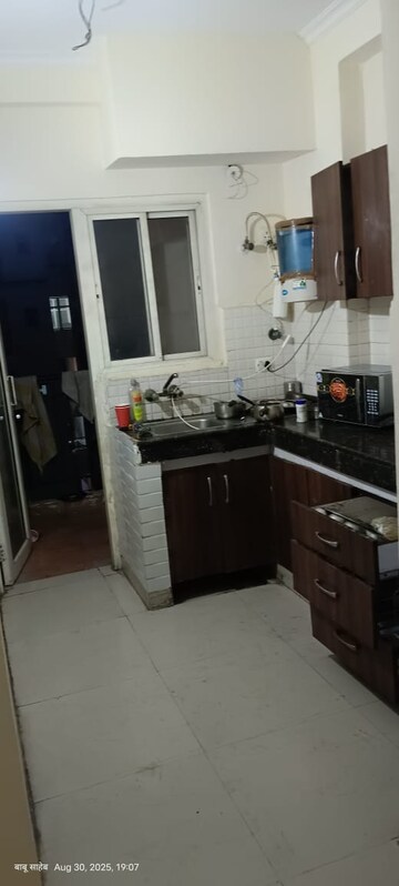 Kitchen in 2 BHK Apartment at Antriksh Golf View, Sector 78 – for Rent