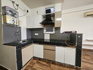 Kitchen in 3 BHK Apartment at Mahindra Luminare, Sector 59 – for Sale