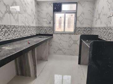 Kitchen in 1 BHK Apartment at DGS Sheetal Tapovan, Malad East – for Rent