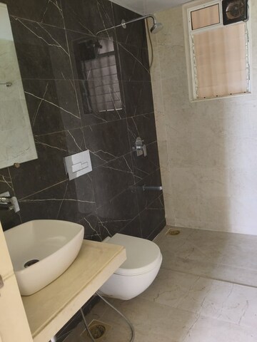 Bathroom in 1.5 BHK Apartment at Dosti West County, Balkum Pada – for Rent
