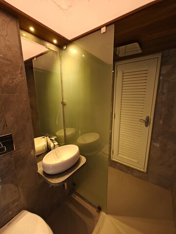 Bathroom in 2 BHK Apartment at Ruparel Ariana, Parel – for Rent