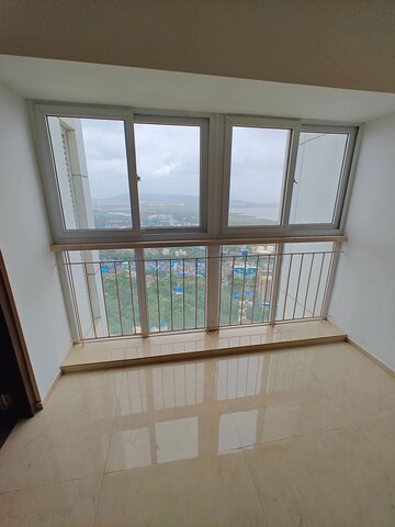 Room in 2 BHK Apartment at Ruparel Ariana, Parel – for Rent