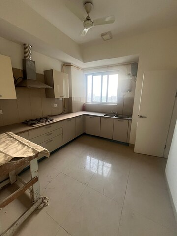 Kitchen in 4 BHK Penthouse at Emaar MGF The Palm Drive Villas, Sector 66 – for Sale
