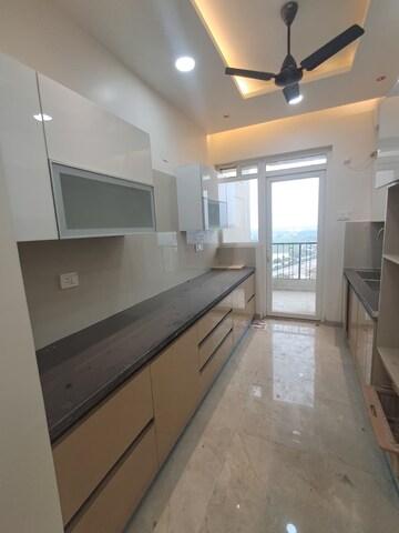 Kitchen in 3 BHK Apartment at Artique Uptown Skylla, International Airport Road – for Rent