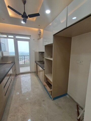 Kitchen in 3 BHK Apartment at Artique Uptown Skylla, International Airport Road – for Rent