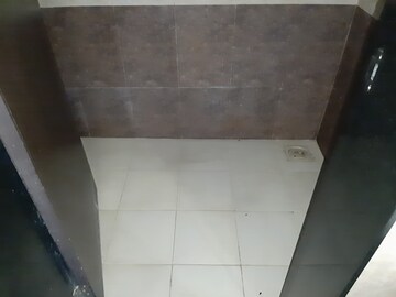 Bathroom in 1 BHK Apartment at Paranjape Schemes Madhukosh, Dhayari – for Rent