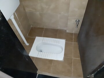Bathroom in 1 BHK Apartment at Paranjape Schemes Madhukosh, Dhayari – for Rent