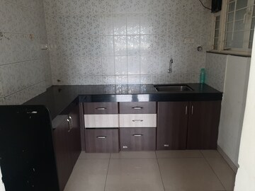 Kitchen in 2 BHK Apartment at Paranjape Schemes Madhukosh, Dhayari – for Rent