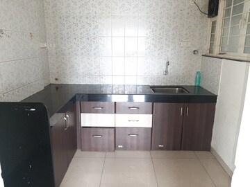 Kitchen in 2 BHK Apartment at Paranjape Schemes Madhukosh, Dhayari – for Rent