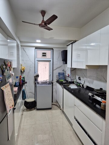 Team Area in 2 BHK Apartment at Ruparel Ariana, Parel – for Rent