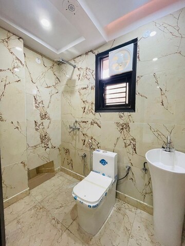 Bathroom in 3 BHK Builder Floor at New Ashiyana Apartment, Dwarka Mor – for Rent