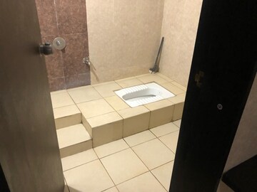 Bathroom in 3 BHK Apartment at Paranjape Schemes Madhukosh, Dhayari – for Rent