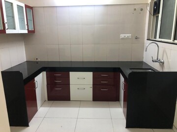 Kitchen in 3 BHK Apartment at Paranjape Schemes Madhukosh, Dhayari – for Rent