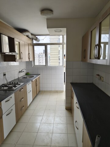 Kitchen in 2 BHK Apartment at Ansal Sushant Estate, Sector 52 – for Sale
