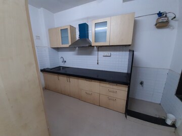 Kitchen in 3 BHK Apartment at SRK Mango Nest, Sinhagad Road – for Rent