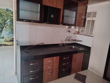 Kitchen in 2 BHK Apartment at Freebird Green Spirit, Thergaon – for Sale