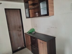 Kitchen in 2 BHK Apartment at Freebird Green Spirit, Thergaon – for Sale