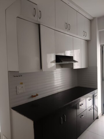 Kitchen in 2.5 BHK Apartment at Gulshan Bellina, Sector 16 Greater Noida – for Rent