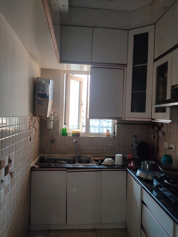 Kitchen in 2 BHK Apartment at Gaur City 2 - 14th Avenue, Sector 16c Greater Noida – for Rent