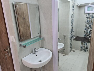Bathroom in 3 BHK Apartment at Safdarjung Development Area – for Rent