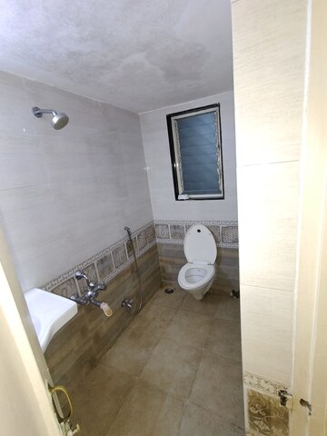 Bathroom in 3 BHK Apartment at Yogi Park CHS Koregaon, Koregaon – for Rent