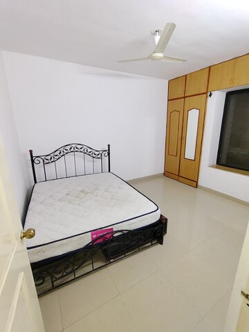Bedroom in 3 BHK Apartment at Yogi Park CHS Koregaon, Koregaon – for Rent
