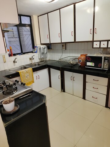 Kitchen in 3 BHK Apartment at Yogi Park CHS Koregaon, Koregaon – for Rent