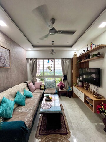 Living Room in 2 BHK Apartment at Lodha Amara, Kolshet Road – for Sale