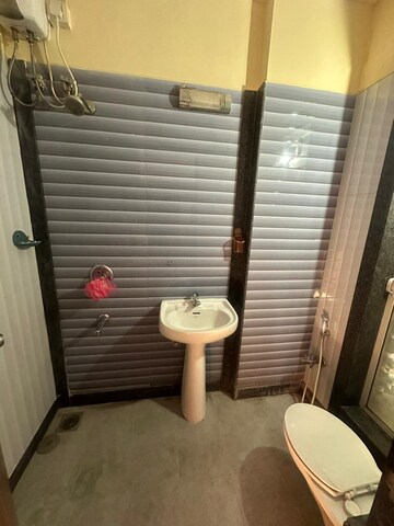 Bathroom in 2 BHK Apartment at Asha Ashok Smruti, Vadavali – for Rent