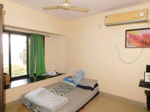 Bedroom in 2 BHK Apartment at Swapnalok Towers, Malad East – for Sale