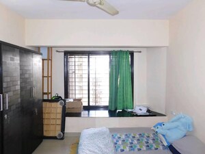 Bedroom in 2 BHK Apartment at Swapnalok Towers, Malad East – for Sale