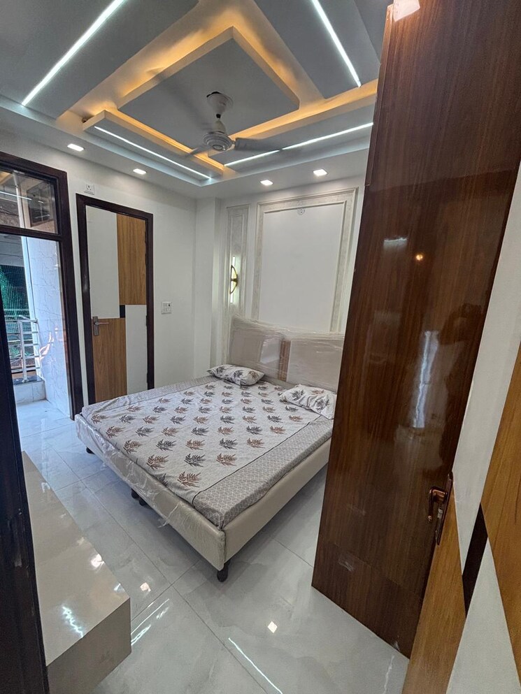 Bedroom, mohan garden 2 Bedroom 65 Sq.Yd. Builder Floor In Mohan Garden Delhi 9132265