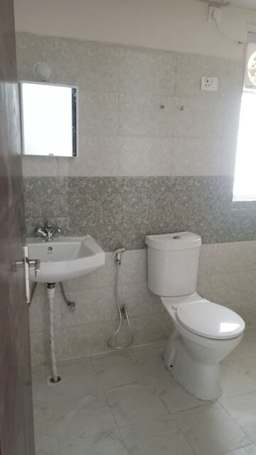 Bathroom in 2 BHK Apartment at Amrapali Golf Homes, Sector 4 Greater Noida – for Rent