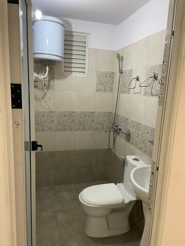 Bathroom in 2 BHK Apartment at Windlass River Valley, Harrawala – for Rent