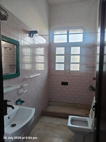 Bathroom in 3 BHK Apartment at RWA Apartments Sector 92, Sector 92 – for Rent