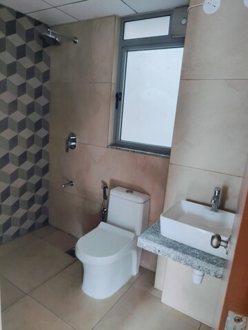 Bathroom in 2 BHK Apartment at Kalpataru Immensa, Kolshet Road – for Rent