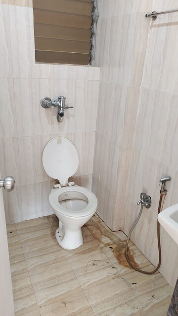 Bathroom in 1 BHK Apartment at Bindra Complex, Andheri East – for Rent