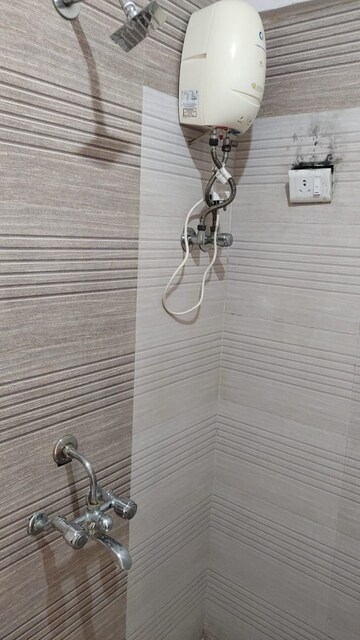 Bathroom in 1 BHK Apartment at Bindra Complex, Andheri East – for Rent