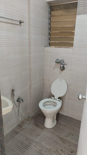 Bathroom in 1 BHK Apartment at Bindra Complex, Andheri East – for Rent