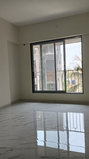 Room in 2 BHK Apartment at Prerana CHS, Borivali West – for Sale
