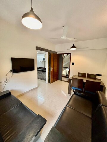 Living Room in 1 BHK Apartment at Khar West – for Rent
