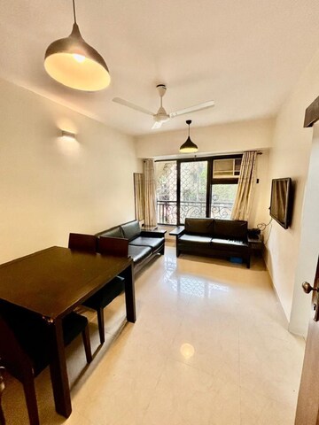 Living Room in 1 BHK Apartment at Khar West – for Rent
