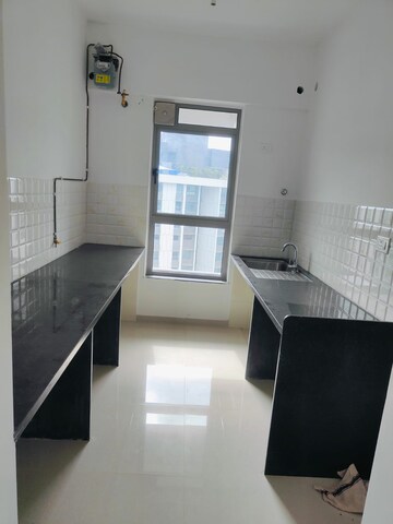 Kitchen in 3 BHK Apartment at Kalpataru Immensa, Kolshet Road – for Rent