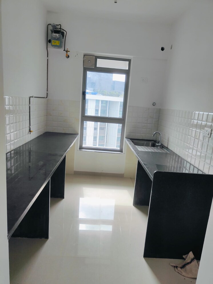 Kitchen, kalpataru-immensa 3 Bedroom 950 Sq.Ft. Apartment In Kolshet Road Thane 9132894