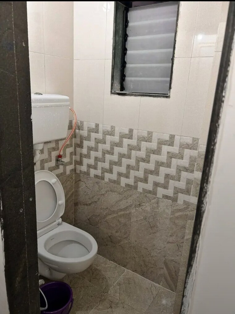 Bathroom, unnat nagar 1 Bedroom 550 Sq.Ft. Apartment In Unnat Nagar Mumbai 9132906